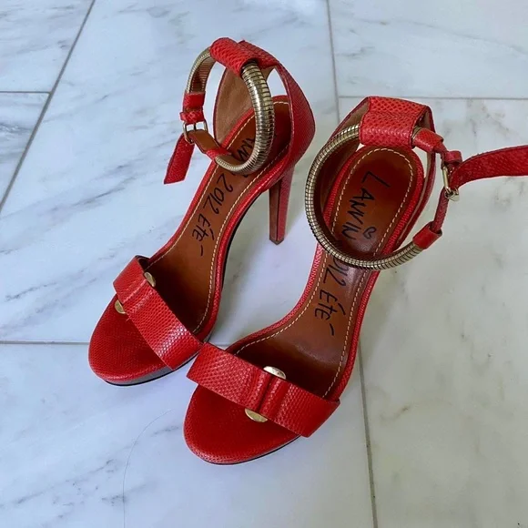 Burnt orange snakeskin with gold detail shoes featured